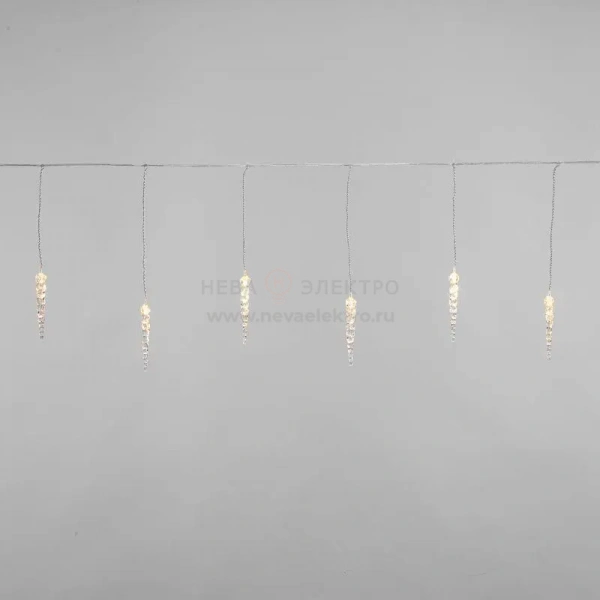 Гирлянда светодиодная "Айсикл" (бахрома) "Сосульки" 1.5х0.25м 10LED тепл. бел. 0.51Вт IP20 провод прозр. Neon-Night 303-067